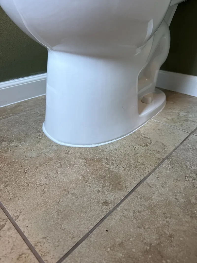 Toilet base re-caulking